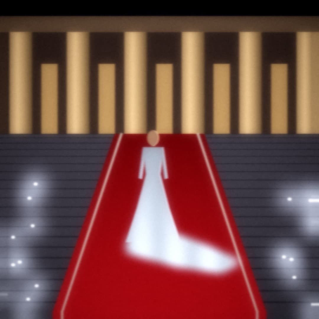 White gown on the red carpet of a grand staircase, amid flashes